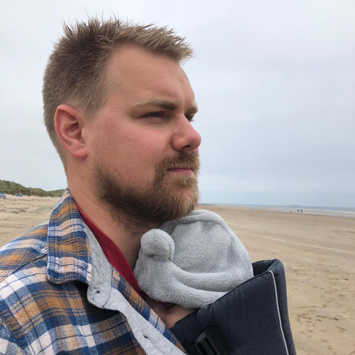 Standing on beach